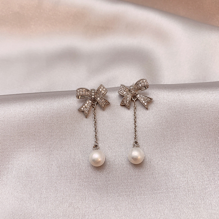 South Korea fashion new 925 silver needle earring bowknot long pearl earring is acted the role of temperament all match micro set ear nail female 